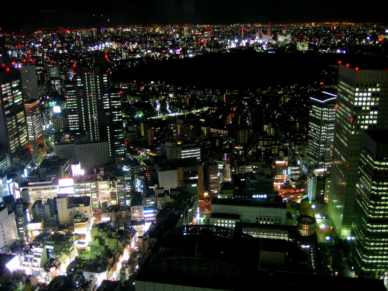 Shinjuku Tokyo night skyline showing the urban district, not a specific hotel
