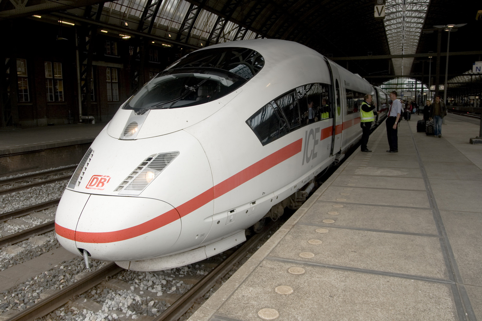 German ICE train at Amsterdam Centraal station, illustrating European rail travel rather than a guaranteed ticket product