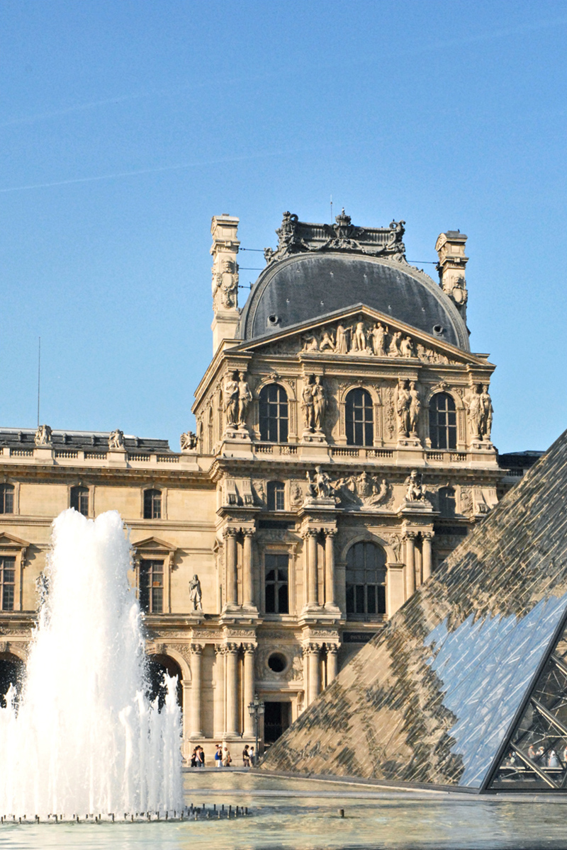 Louvre Museum pyramid and Pavillon Denon photographed in 2010, not present-day ticket queues